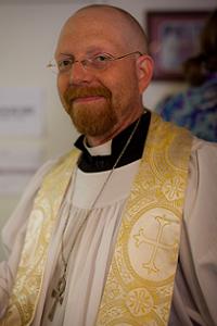 Father Samuel Osborne in vestments